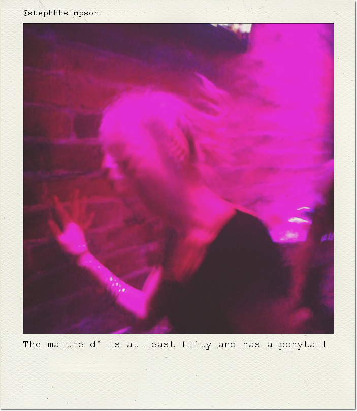 The maitre d' is at least fifty and has a ponytail.