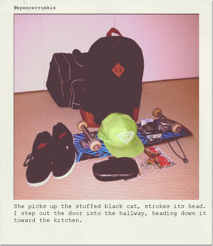 She picks up the stuffed black cat, strokes its head. I step out the door into the hallway, heading down it toward the kitchen.