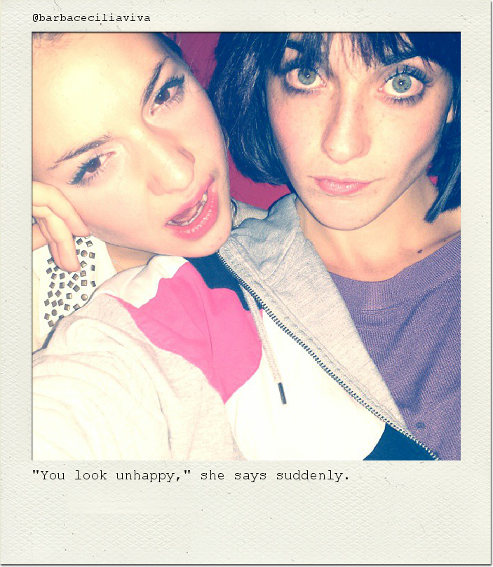 "You look unhappy," she says suddenly.