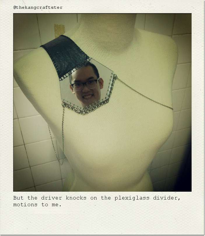 But the driver knocks on the plexiglass divider, motions to me.