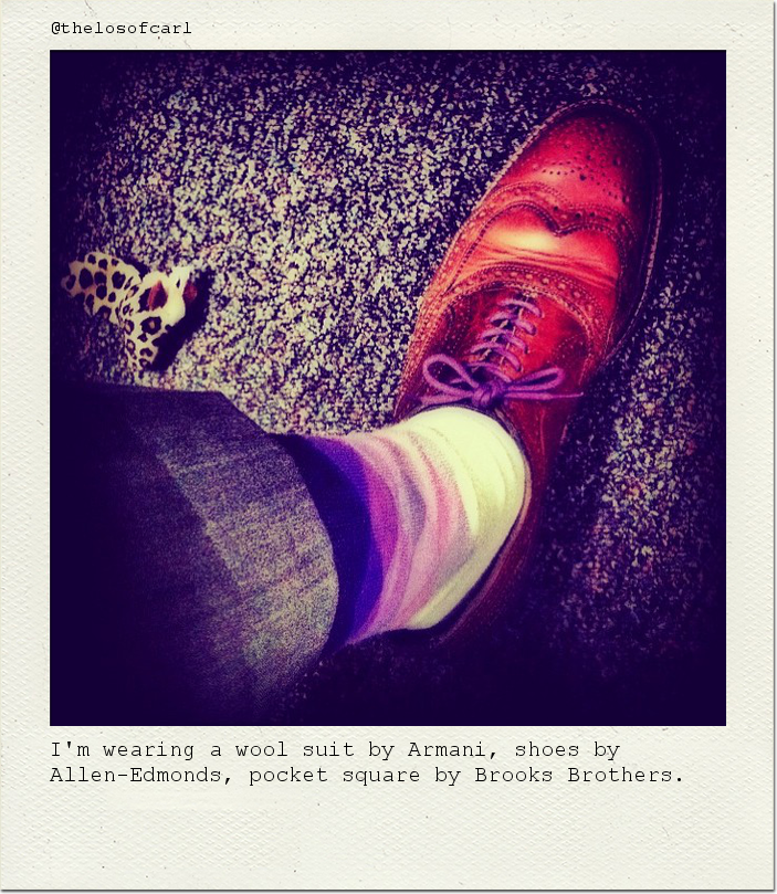 I'm wearing a wool suit by Armani, shoes by Allen-Edmonds, pocket square by Brooks Brothers.